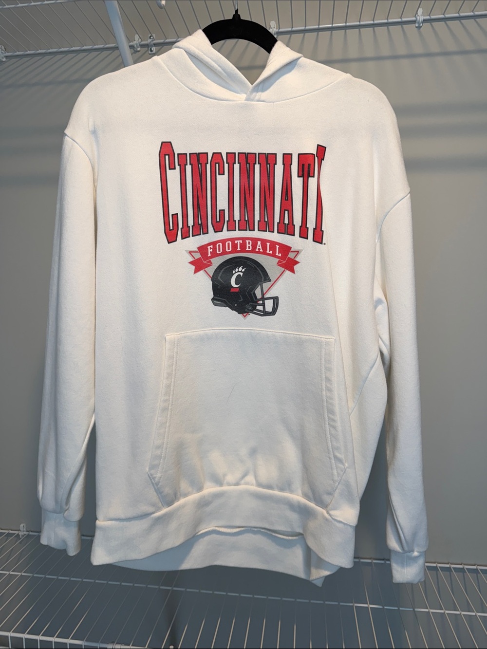Cincinnati Football White Hoodie with Helmet Graphic